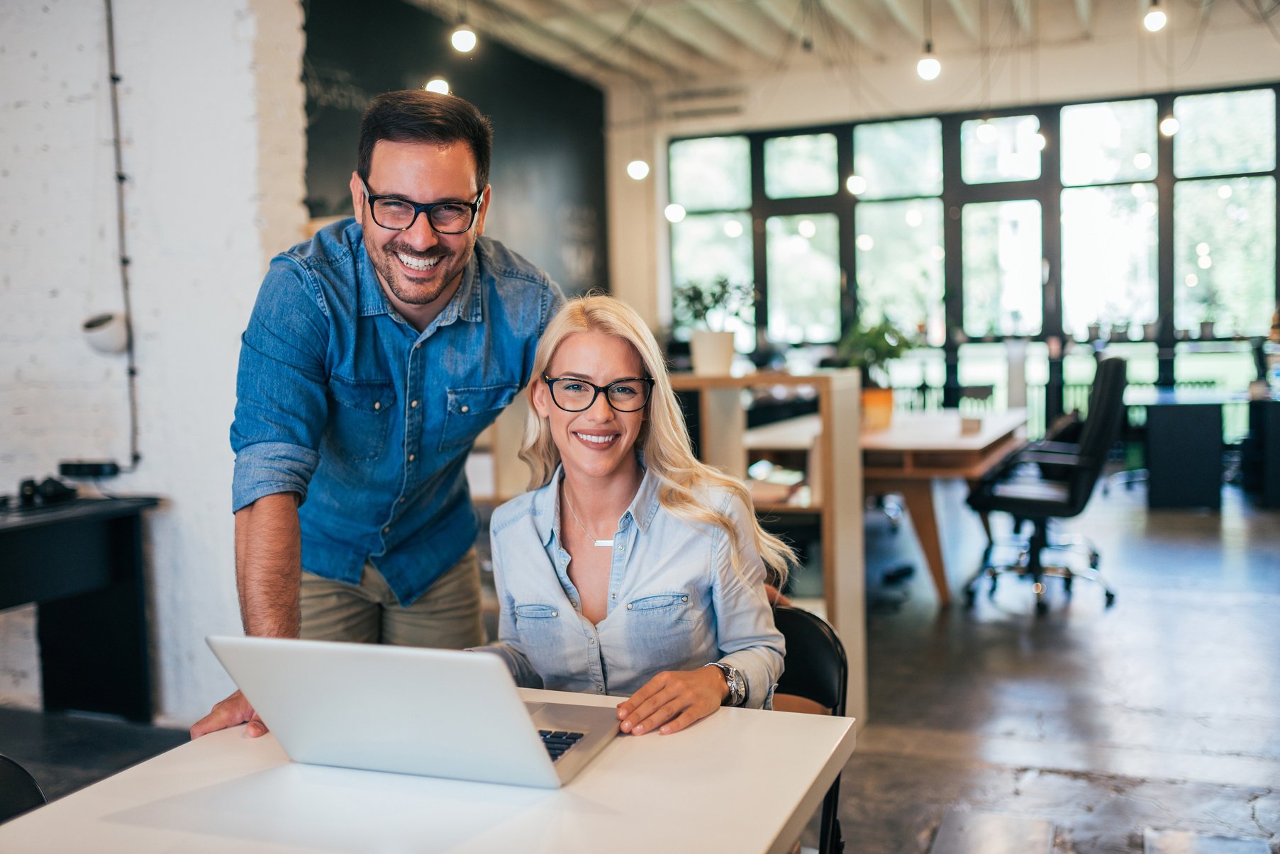 Two creative small business owners at work.